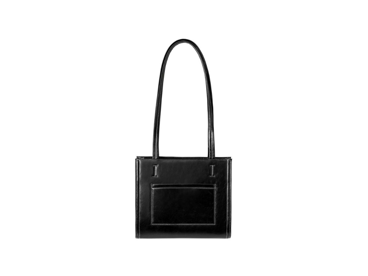 https://d2cva83hdk3bwc.cloudfront.net/stand-oil-oblong-bag-mini-in-vegan-leather-stitch-black-3.jpg