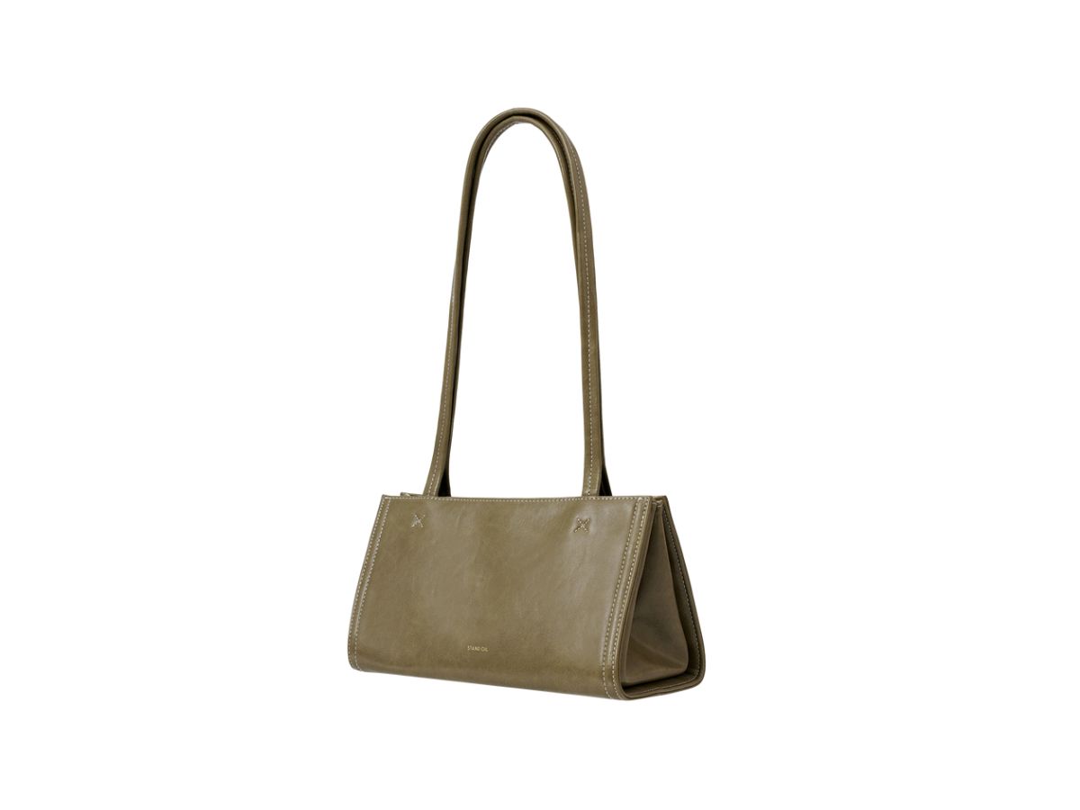 https://d2cva83hdk3bwc.cloudfront.net/stand-oil-oblong-bag-tiny-in-vegan-leather-basil-2.jpg