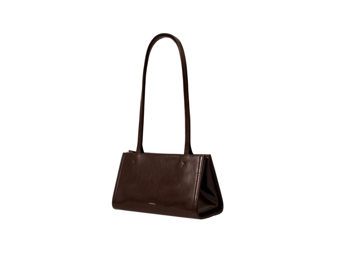https://d2cva83hdk3bwc.cloudfront.net/stand-oil-oblong-bag-tiny-in-vegan-leather-marron-2.jpg