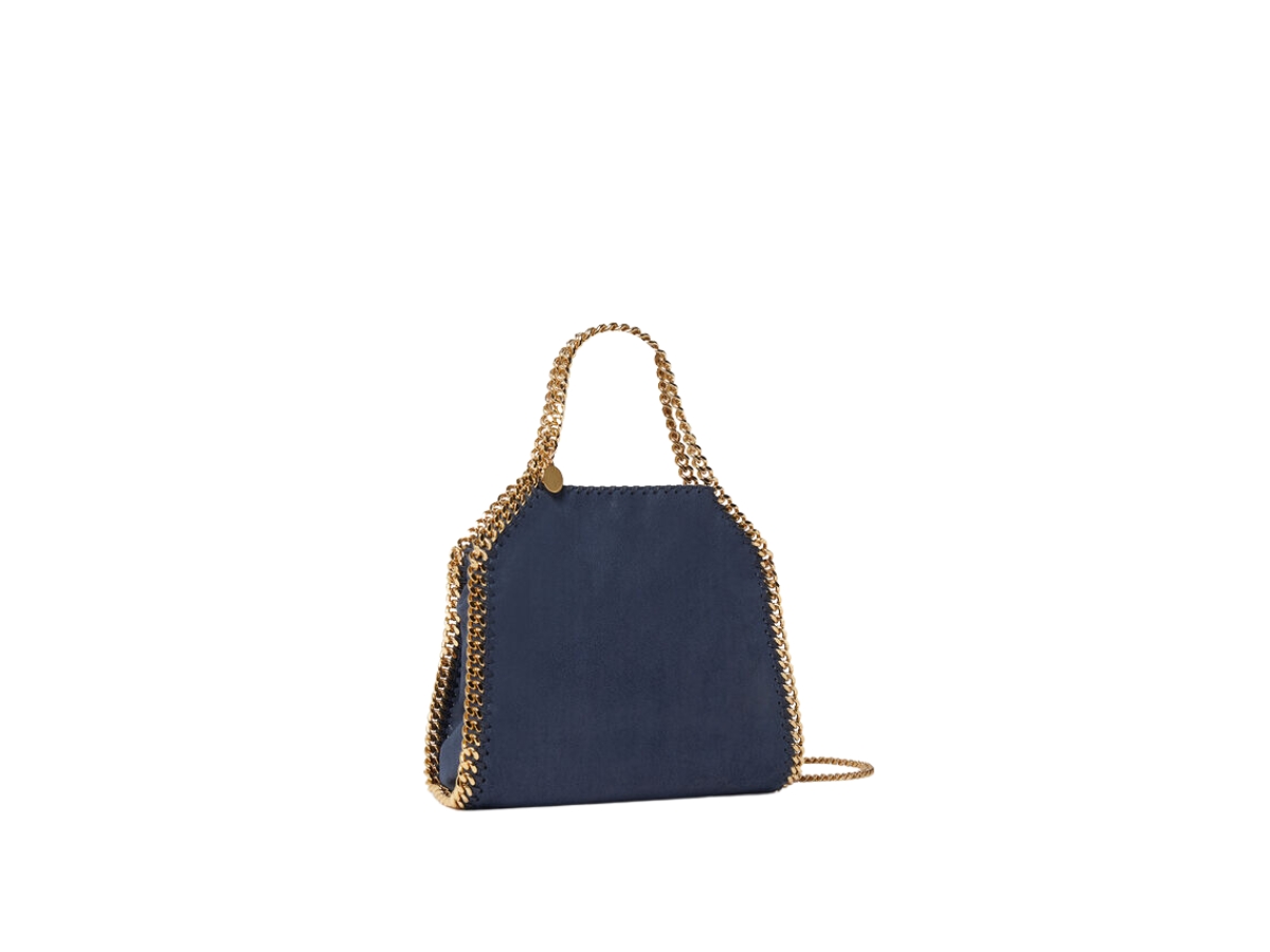 https://d2cva83hdk3bwc.cloudfront.net/stella-mccartney-falabella-mini-tote-bag-in-matte-vegan-shaggy-deer-fabric-with-semi-gloss-grain-indigo-moon-2.jpg