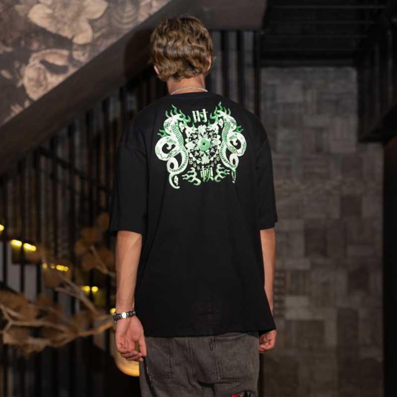 https://d2cva83hdk3bwc.cloudfront.net/stonedandco_golden-jade---duo-snake-tee-black-3.jpg