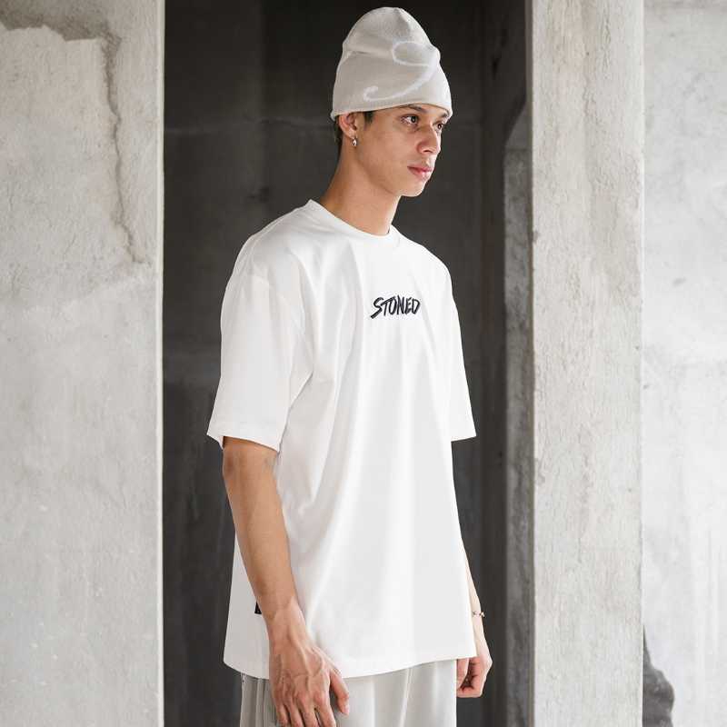 https://d2cva83hdk3bwc.cloudfront.net/stonedandco_wbb25--emblem-tee-white-4.jpg