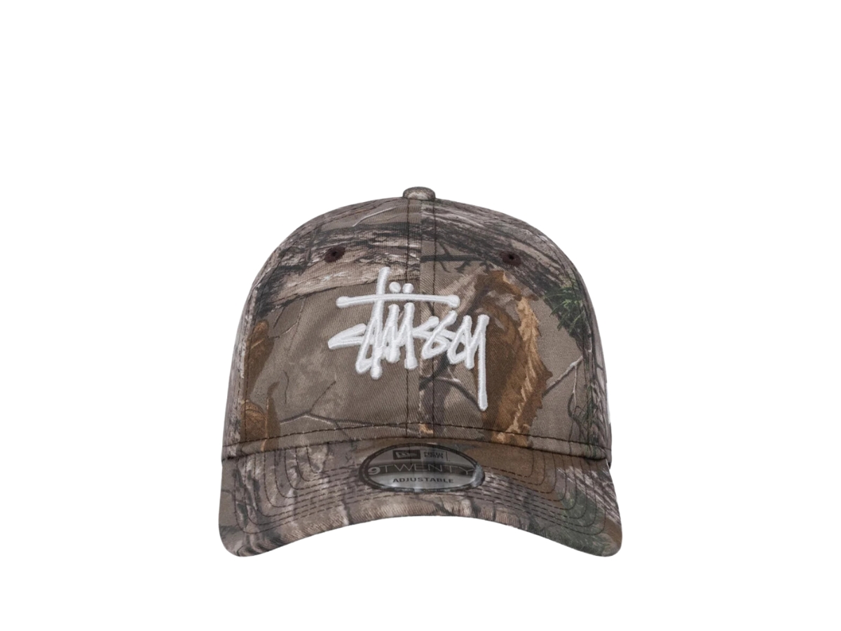 https://d2cva83hdk3bwc.cloudfront.net/stussy-new-era-9twenty-basic-strapback-real-tree-edge-1.jpg