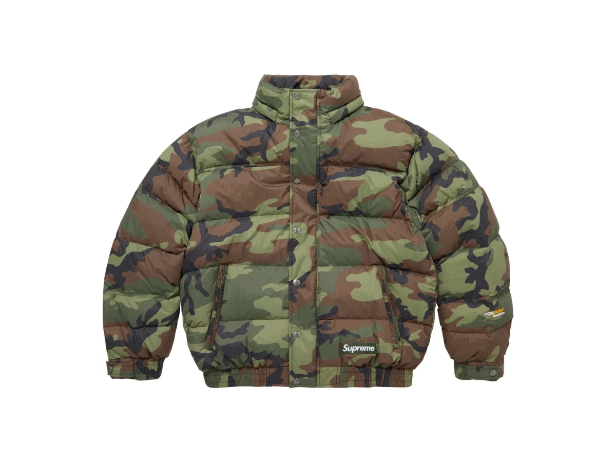 https://d2cva83hdk3bwc.cloudfront.net/sup-jkasf7fdpjwcf-supreme-facemask-700-fill-down-puffer-jacket-woodland-camo-fw25-2.jpg