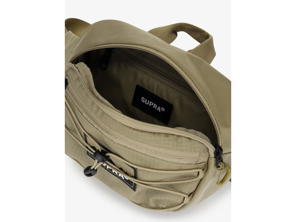 https://d2cva83hdk3bwc.cloudfront.net/supra_supra-outdoor-label-point-hipsack-dark-sand-3.jpg