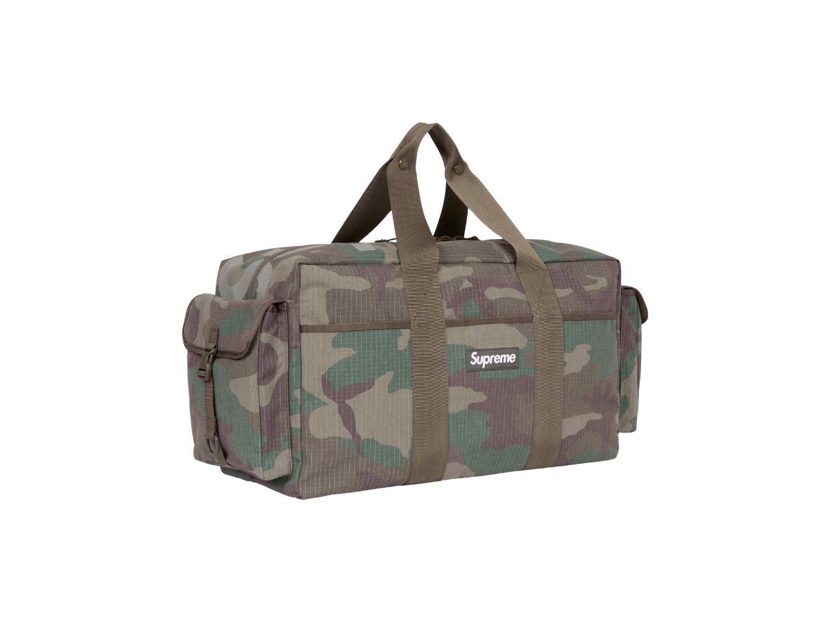 https://d2cva83hdk3bwc.cloudfront.net/supreme-duffle-bag-woodland-camo--ss24--3.jpg