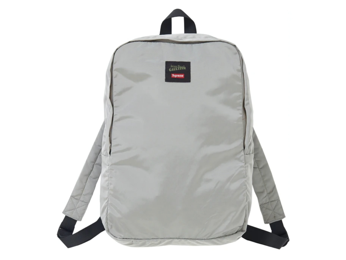 https://d2cva83hdk3bwc.cloudfront.net/supreme-jean-paul-gaultier-reversible-backpack-ma-1-silver-3.jpg