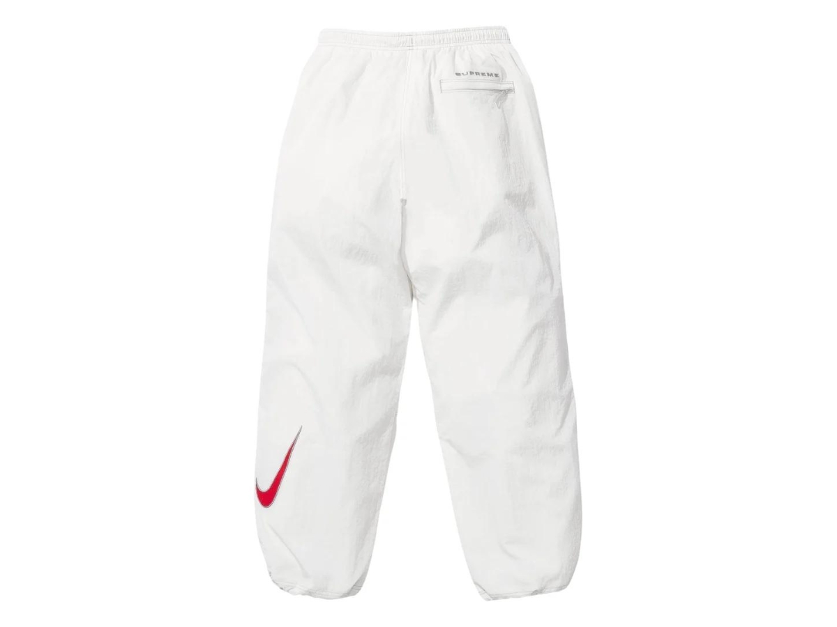 https://d2cva83hdk3bwc.cloudfront.net/supreme-nike-ripstop-track-pant-white-ss24-2.jpg