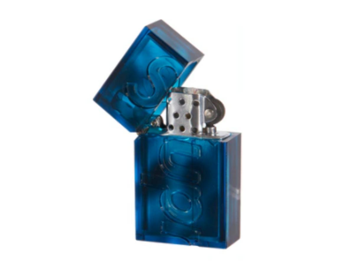 https://d2cva83hdk3bwc.cloudfront.net/supreme-tsubota-pearl-hard-edge-lighter--fw21--blue-2.jpg