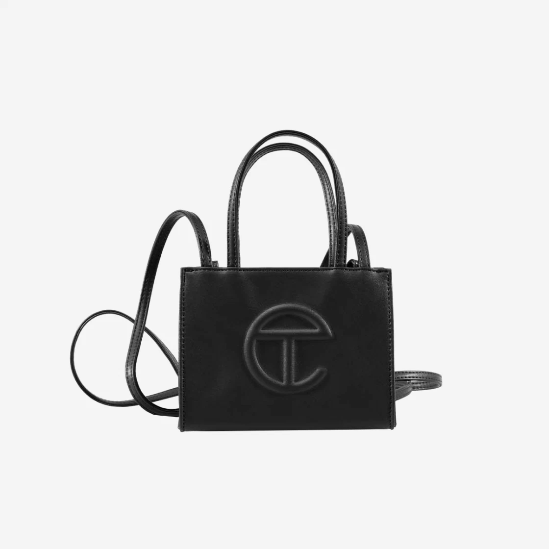https://d2cva83hdk3bwc.cloudfront.net/telfar-small-shopping-bag-black-2.jpg