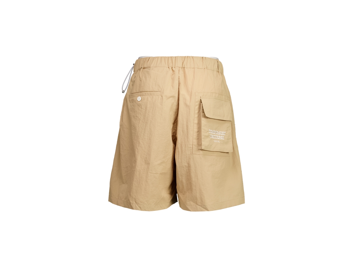 https://d2cva83hdk3bwc.cloudfront.net/temporary-universe-logo-oversized-nylon-outdoor-pants-beige-2.jpg