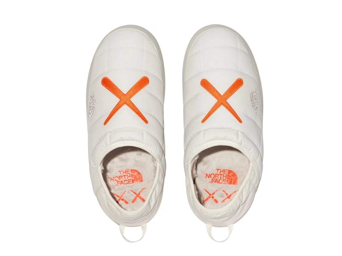 The North Face ThermoBall Traction Mule VS KAWS Moonlight Ivory Orange