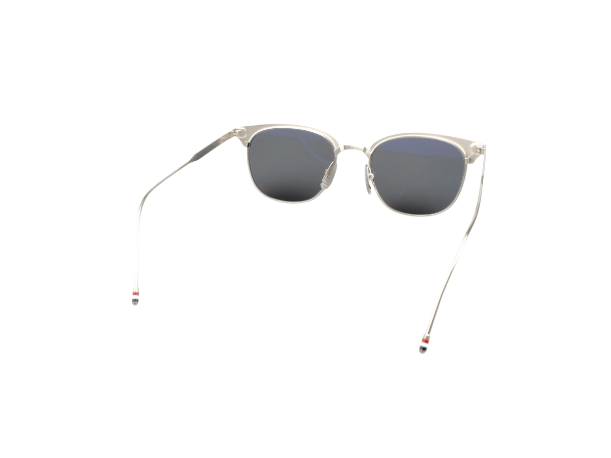 https://d2cva83hdk3bwc.cloudfront.net/thom-browne-tb104-sunglasses-in-titanium-frame-with-demo-lens-silver-3.jpg