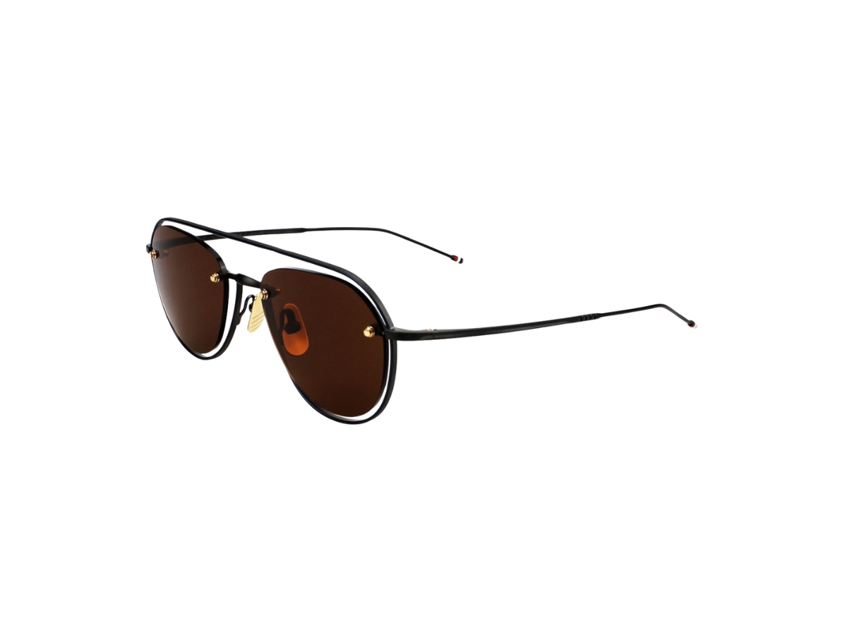 https://d2cva83hdk3bwc.cloudfront.net/thom-browne-tbs112-sunglasses-in-titanium-frame-with-brown-lens-black-3.jpg