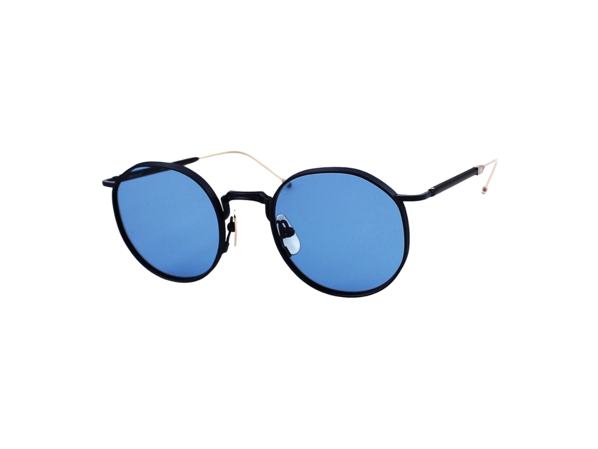 https://d2cva83hdk3bwc.cloudfront.net/thom-browne-tbs125-sunglasses-in-titanium-frame-with-blue-lens-satin-navy-1.jpg