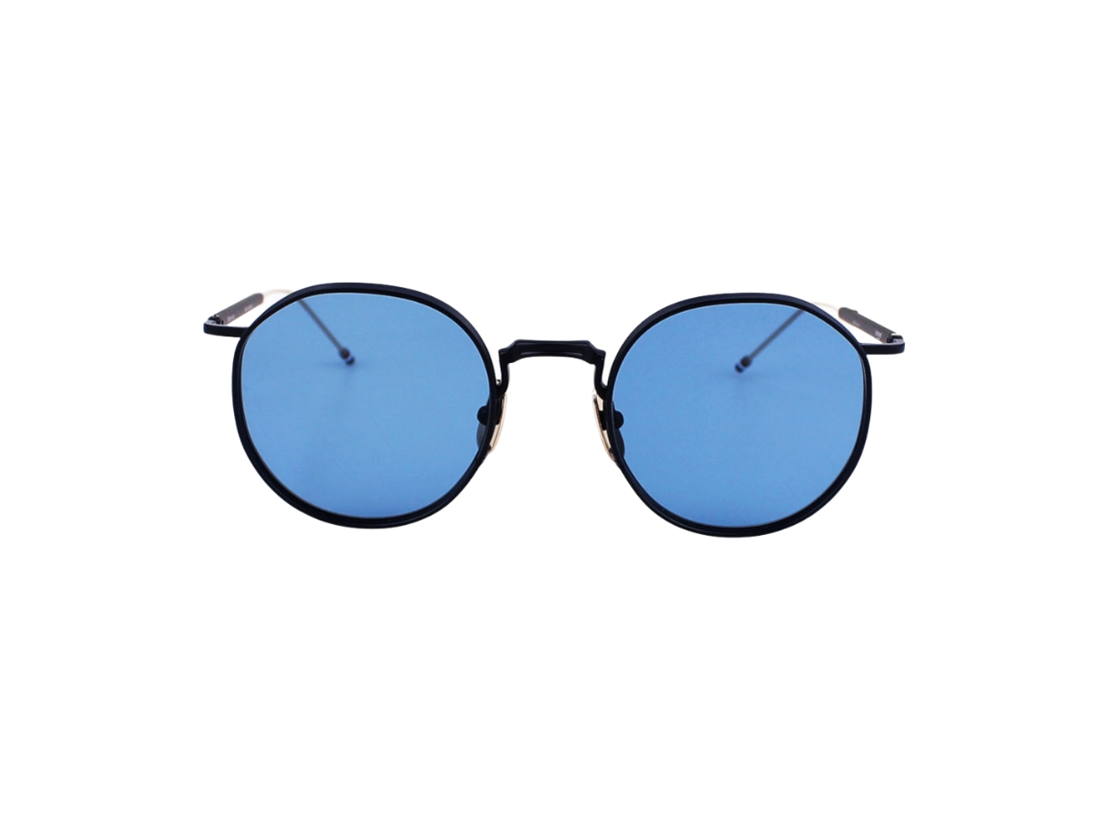 https://d2cva83hdk3bwc.cloudfront.net/thom-browne-tbs125-sunglasses-in-titanium-frame-with-blue-lens-satin-navy-2.jpg