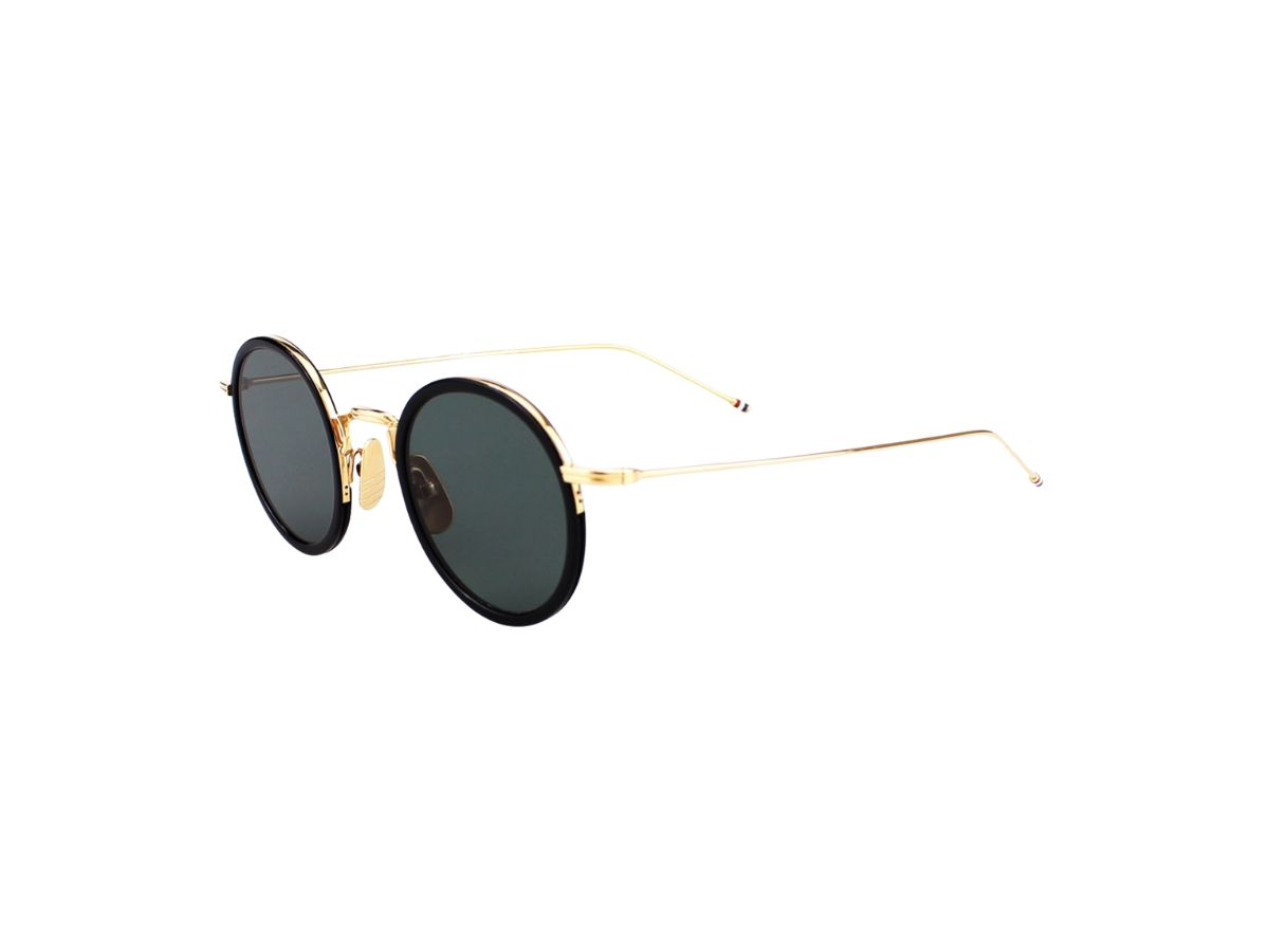 https://d2cva83hdk3bwc.cloudfront.net/thom-browne-tbs906-sunglasses-in-plastic-metal-frame-with-dark-grey-lens-gold-3.jpg