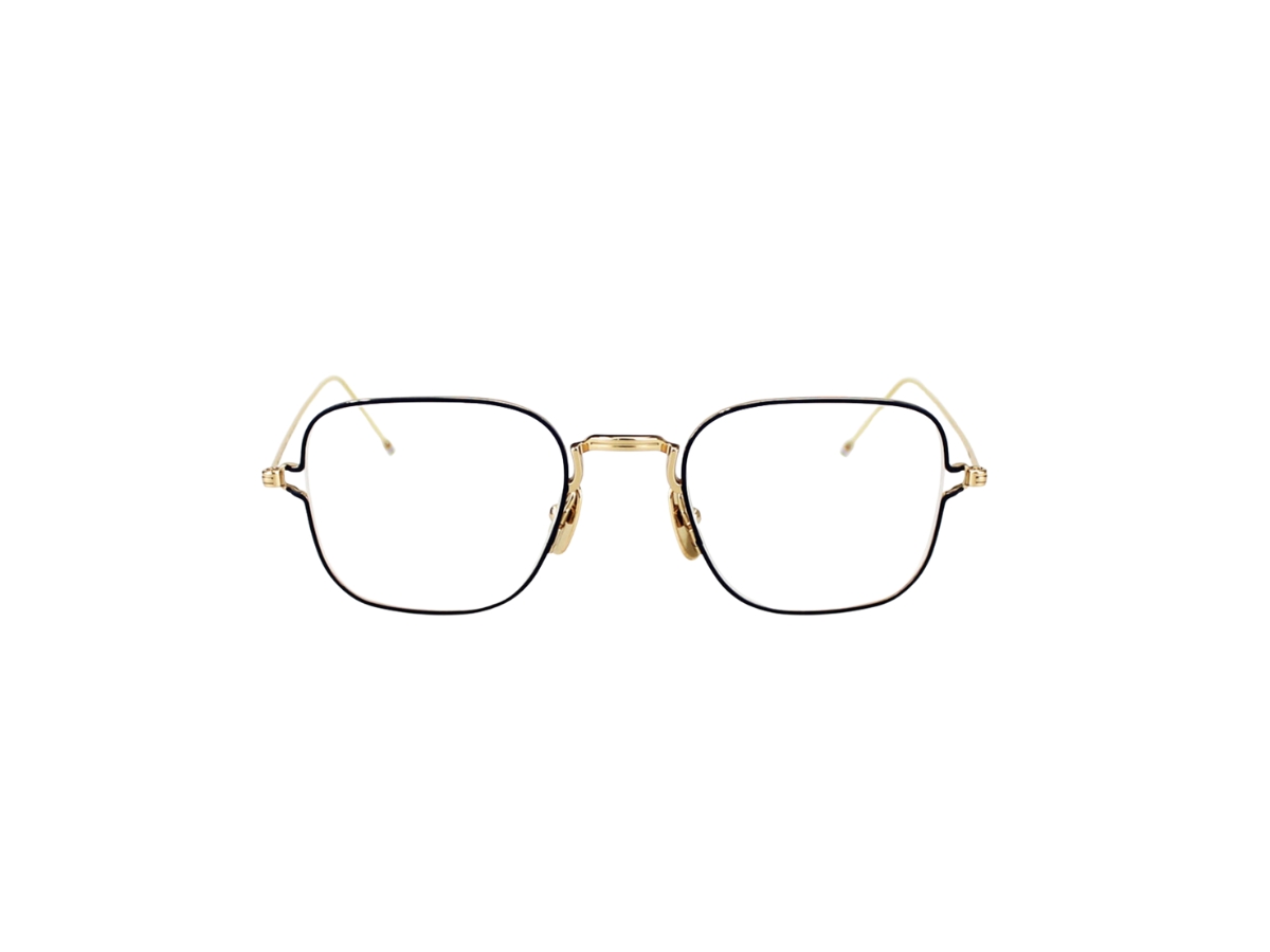 https://d2cva83hdk3bwc.cloudfront.net/thom-browne-tbx116-eyeglasses-in-titanium-frame-with-demo-lens-gold-2.jpg