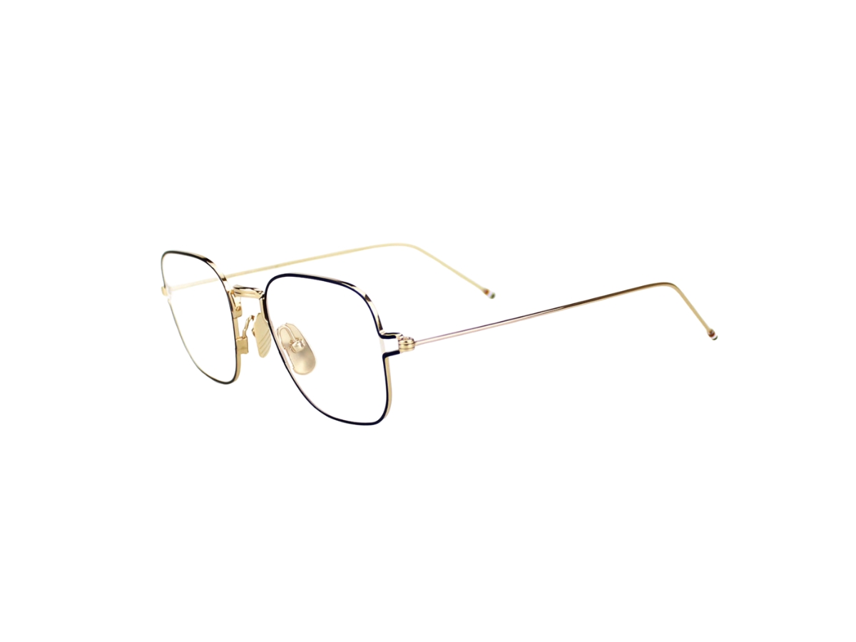 https://d2cva83hdk3bwc.cloudfront.net/thom-browne-tbx116-eyeglasses-in-titanium-frame-with-demo-lens-gold-3.jpg