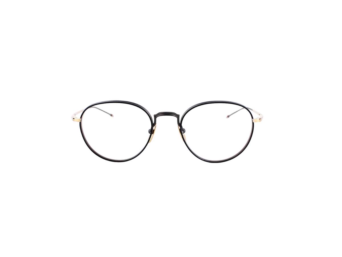 https://d2cva83hdk3bwc.cloudfront.net/thom-browne-tbx119-eyeglasses-in-titanium-frame-with-demo-lens-gold-2.jpg