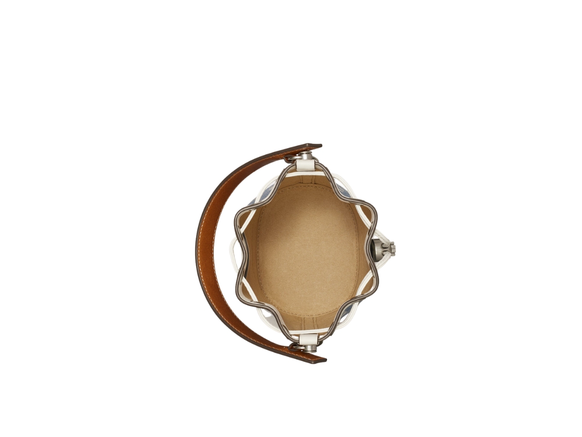 https://d2cva83hdk3bwc.cloudfront.net/tory-burch-mini-t-monogram-bucket-bag-in-denim-jacquard-with-nickel-hardware-pearl-blue-3.jpg