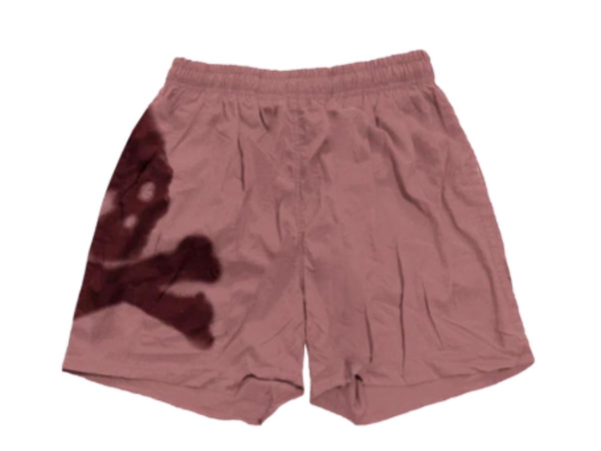 https://d2cva83hdk3bwc.cloudfront.net/travis-scott-cactus-jack-for-mastermind-skull-shorts-washed-red-2.jpg