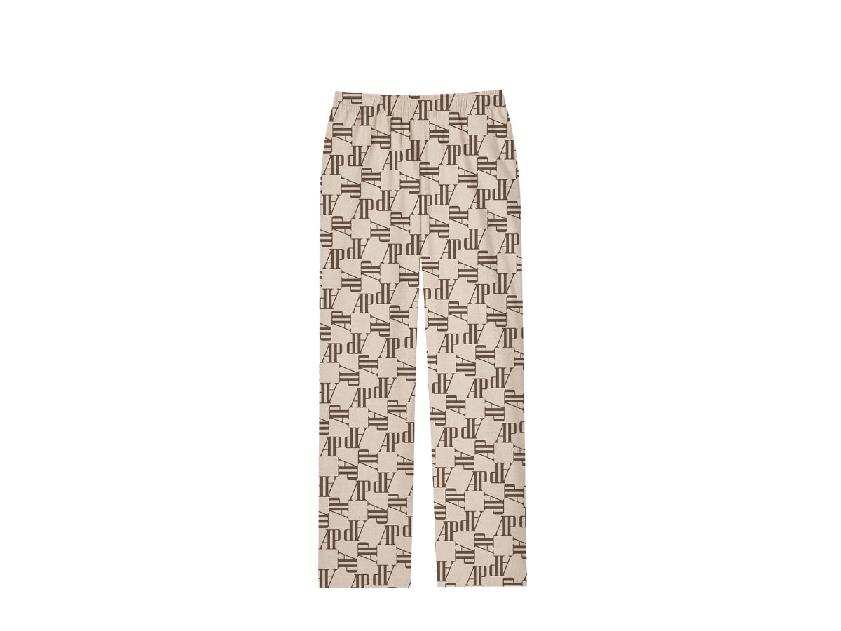 https://d2cva83hdk3bwc.cloudfront.net/travis-scott-cj-x-ap-logo-silk-pajama-pants-ii-beige-2.jpg