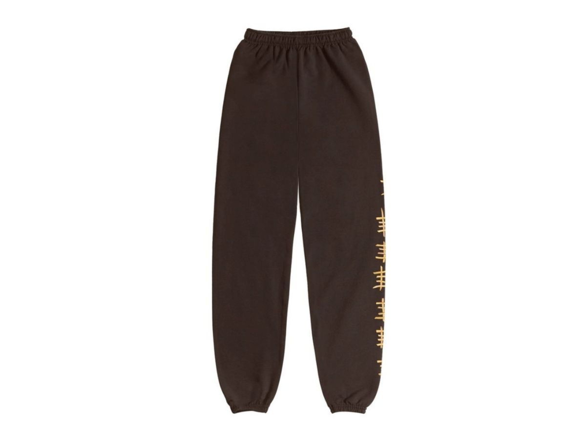 https://d2cva83hdk3bwc.cloudfront.net/travis-scott-x-mcdonald-s-smile-sweatpants-brown-2.jpg