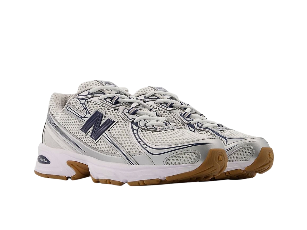 https://d2cva83hdk3bwc.cloudfront.net/u740sn2-new-balance-740-v2-monarch-navy-3.jpg