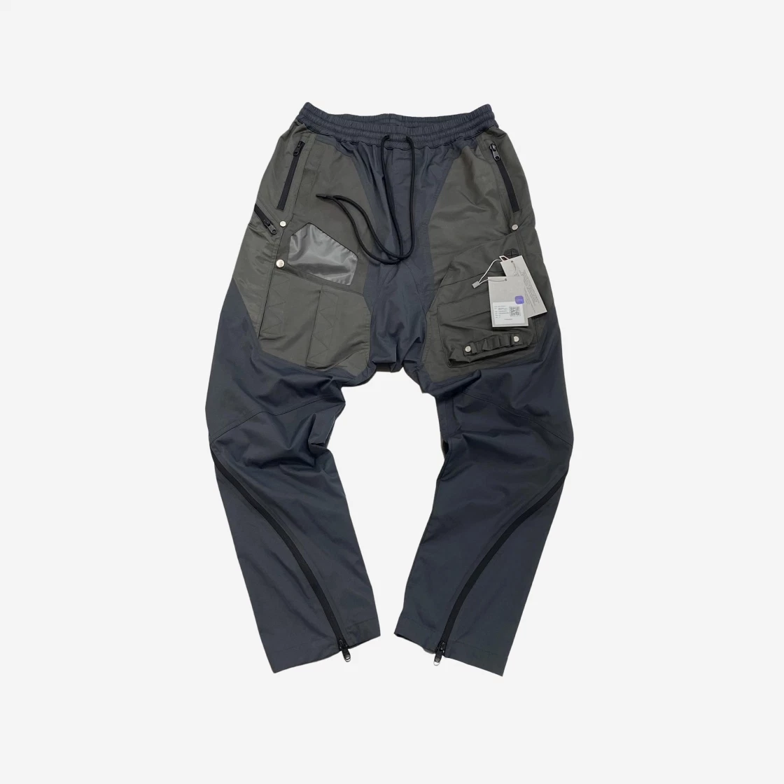 https://d2cva83hdk3bwc.cloudfront.net/undermycar-might-guy-multi-cargo-layered-pants-gamma---22ss-2.jpg